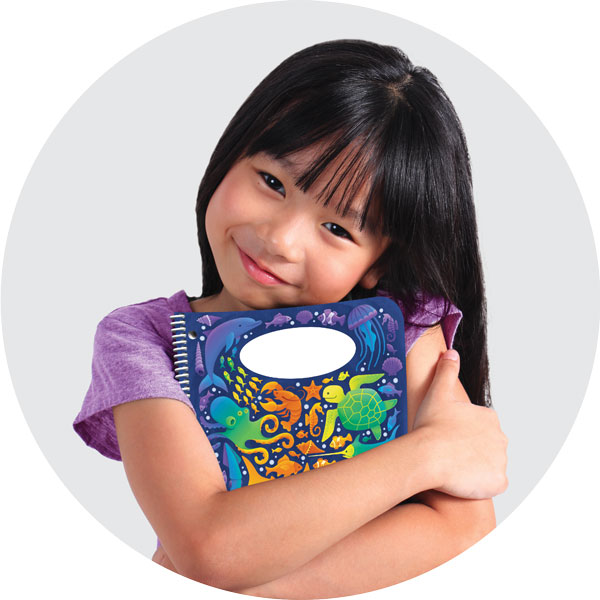 Student Hugging their Planner